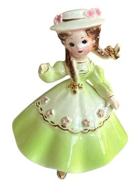 Hand-Painted Ceramic Girl Figurine in Light Green with Pink Accents